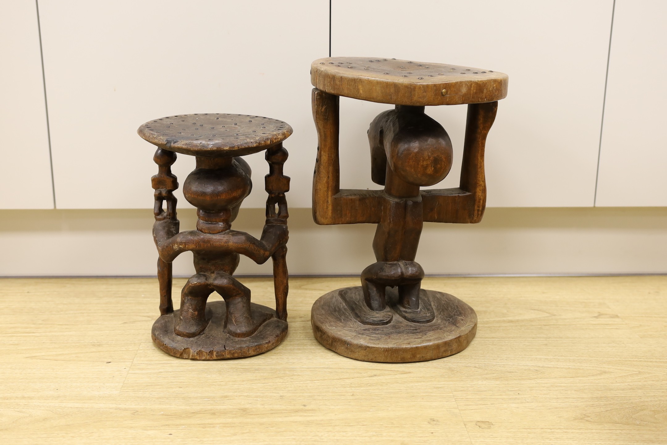 Two Songye (African) tribal stools, carved from the solid, tallest 42cm
